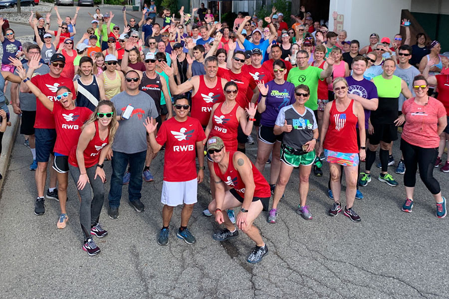 People posing for a photo before race