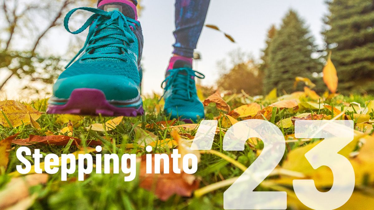 Runner running over leaves and grass