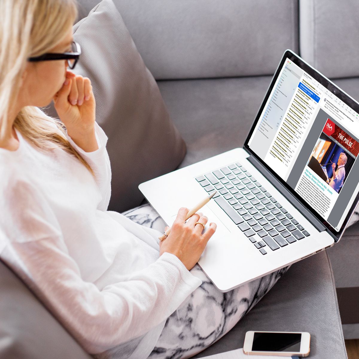 Woman reading newsletter