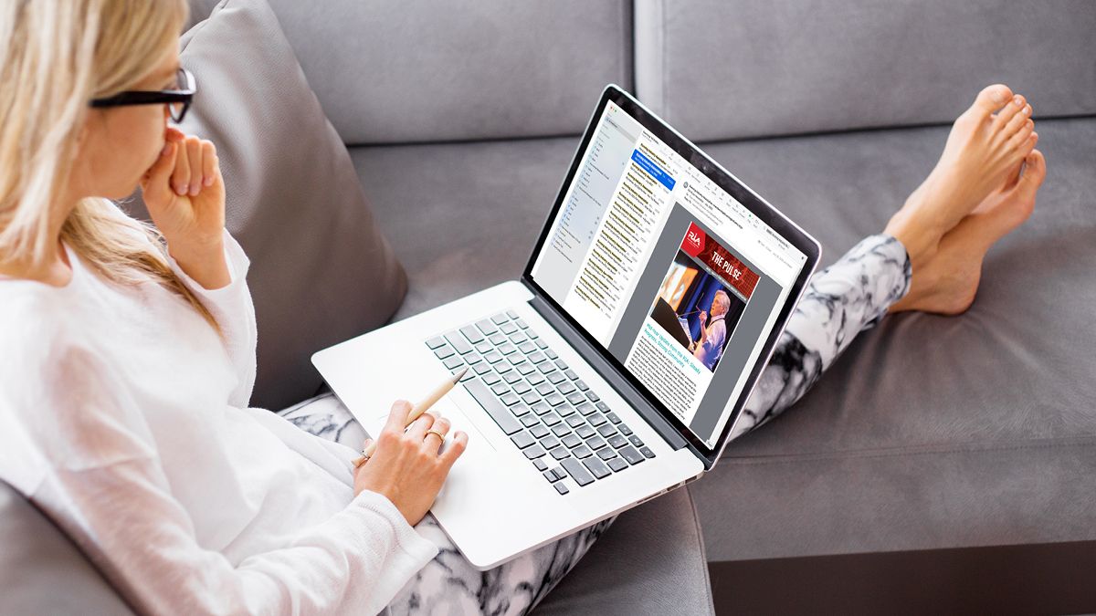 Woman reading newsletter